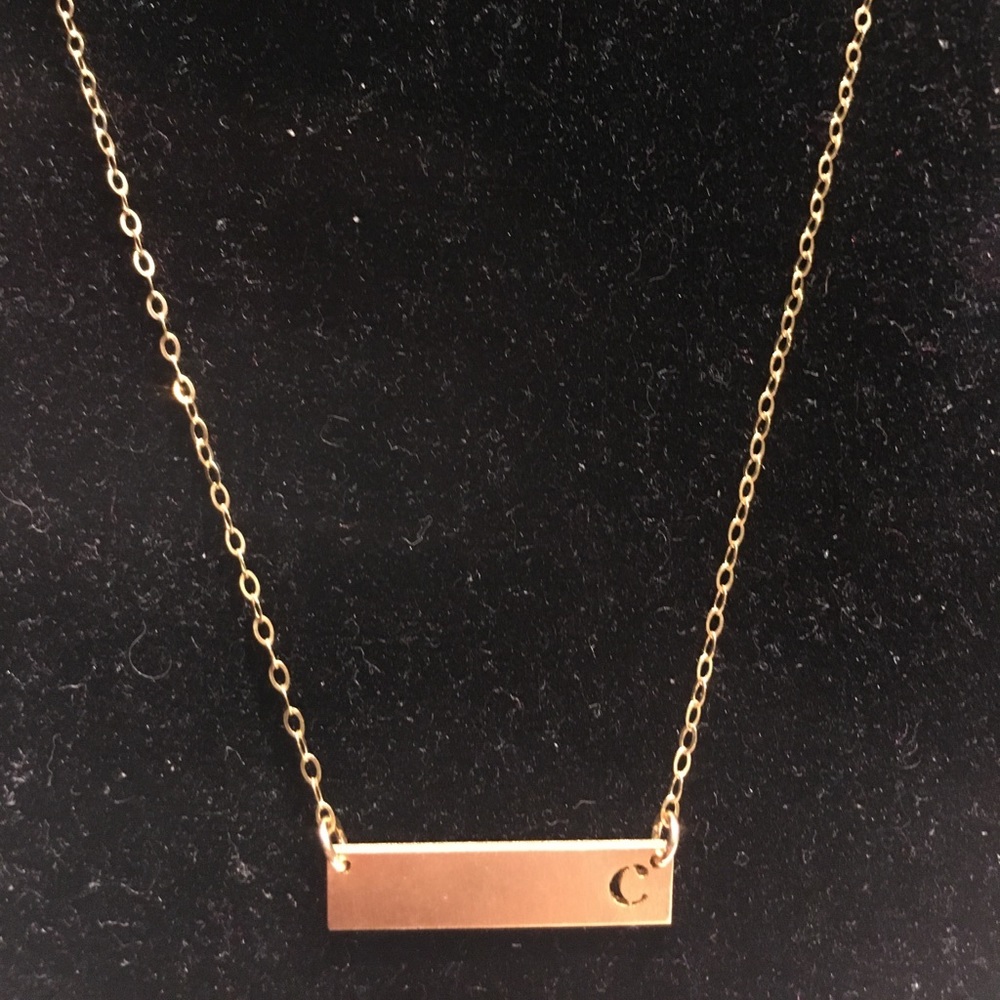 Necklace gold costume jewelry.
